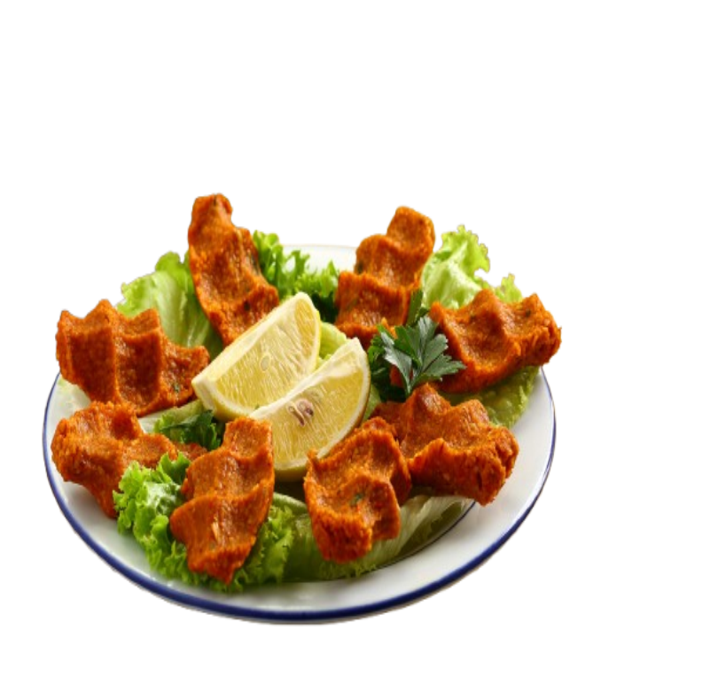 Limon ve marul eşliğinde tabakta servis edilen çiğ köfte